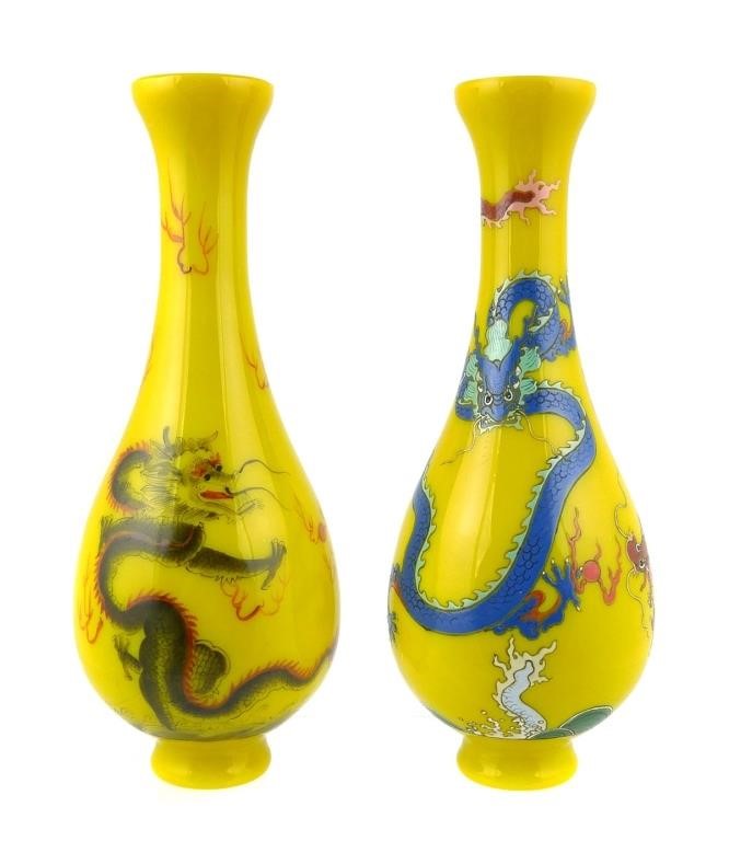 Appraisal: Pair Chinese Yellow Peking Glass Vases with dragon motif measuring