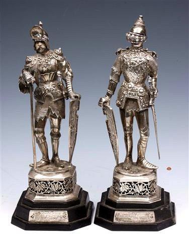 Appraisal: A PAIR OF NUREMBURG SILVER MODELS of knights each in