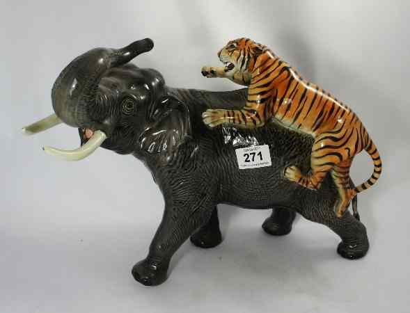 Appraisal: Beswick Large Elephant and Tiger Model one tusk restuck