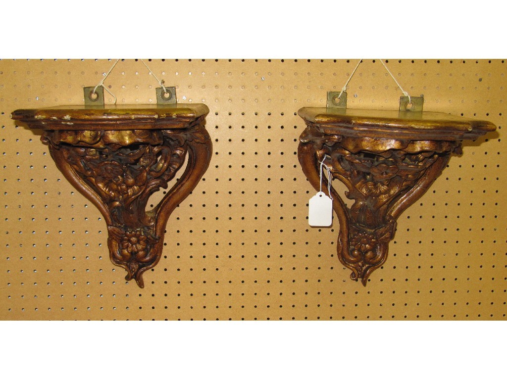 Appraisal: Pair of ornate wall brackets