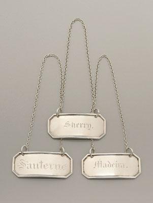 Appraisal: Three coin silver decanter labels octagonal Madeira Sherry and Sauterne