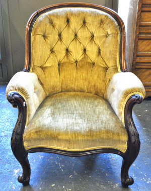 Appraisal: Victorian mahogany framed armchair with yellow button back upholstered and