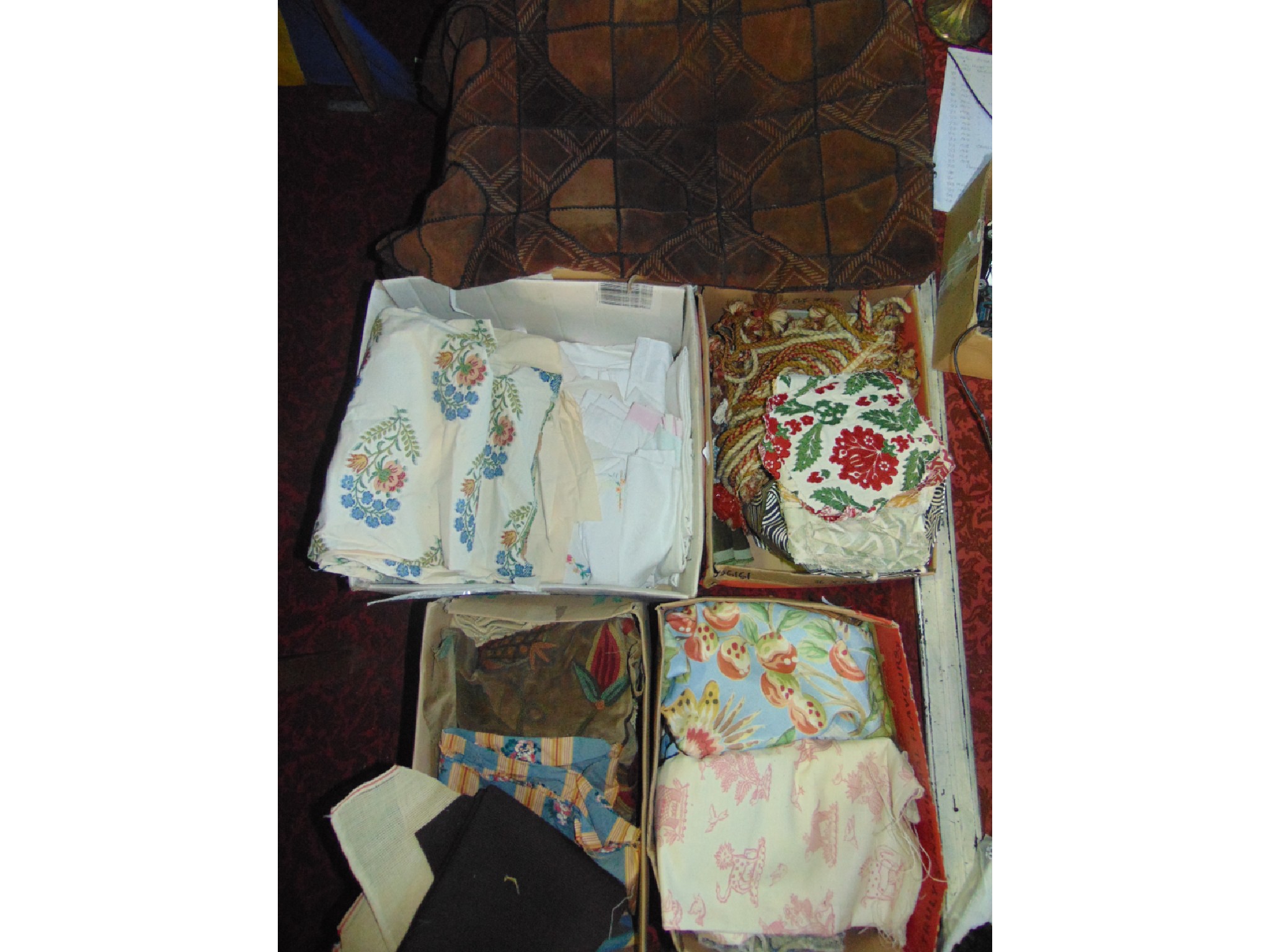 Appraisal: An assortment of fabric cuttings with patterns to include The