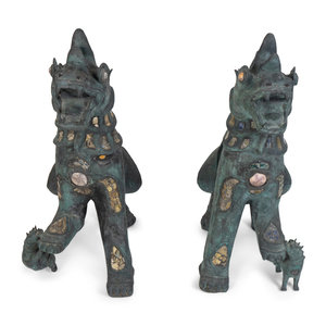 Appraisal: A Pair of Chinese Stone-Inset Bronze Fu-Lions TH CENTURY Height