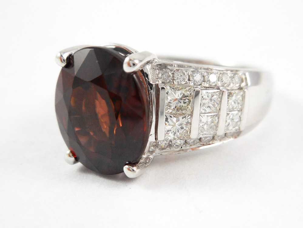 Appraisal: RED ZIRCON DIAMOND AND FOURTEEN KARAT GOLD RING The white