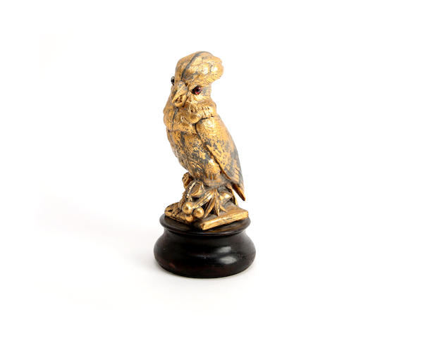 Appraisal: A gilt-brass inkwell in the form of a cockatoo Mounted