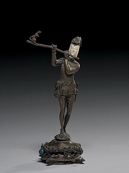 Appraisal: SILVER GILT AND IVORY FIGURE OF THE PIED PIPER OF