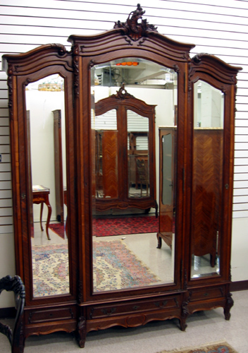 Appraisal: LOUIS XV STYLE MAHOGANY THREE-DOOR BREAKFRONT ARMOIRE French c having