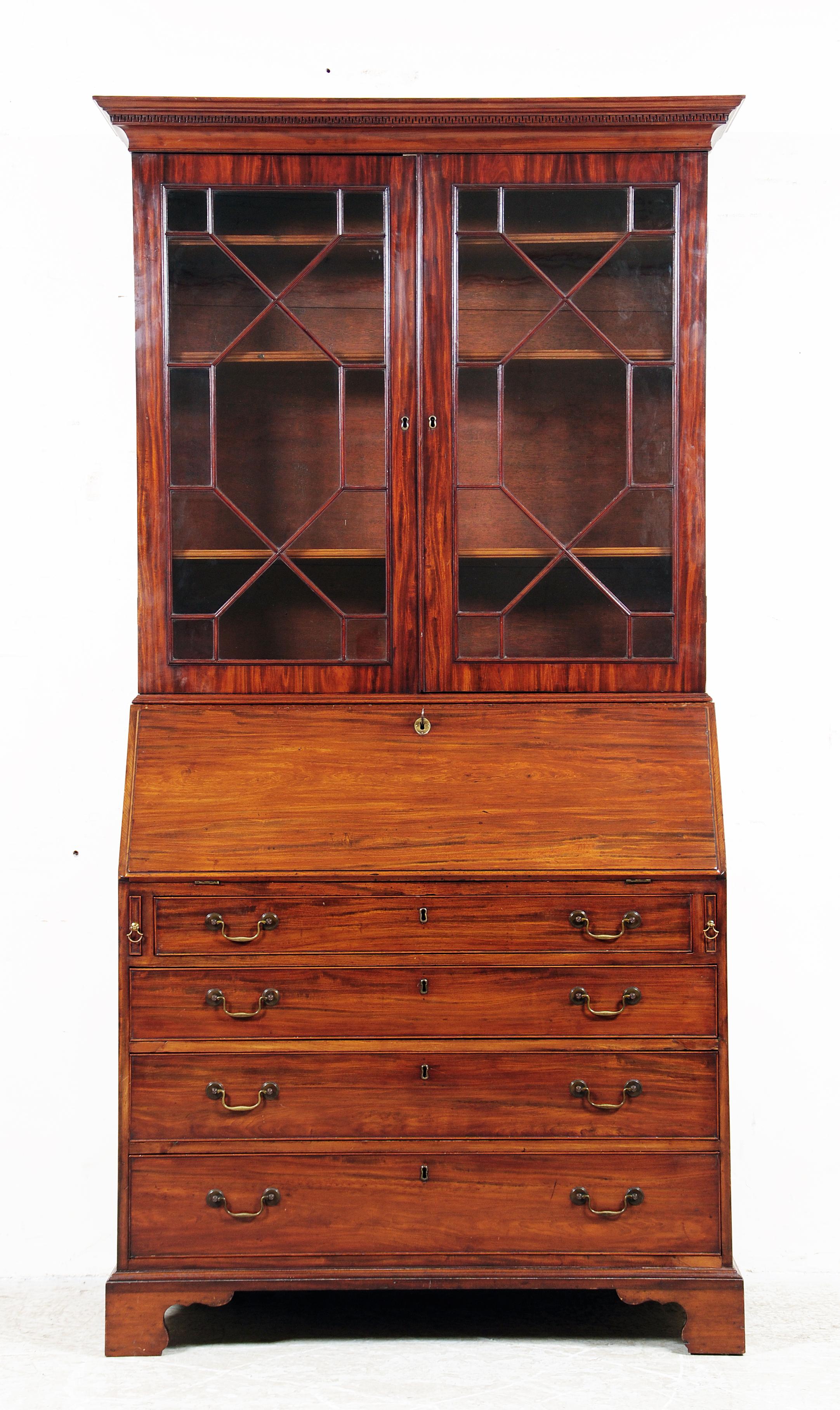 Appraisal: A GEORGE III MAHOGANY BUREAU BOOKCASE the key moulded cornice