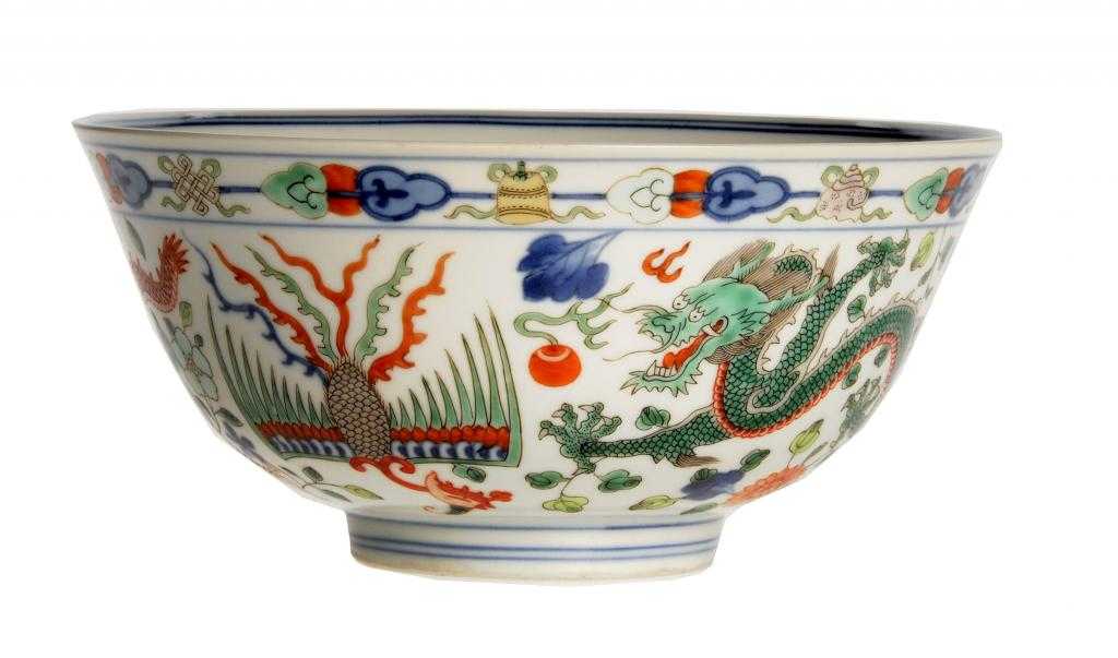 Appraisal: A CHINESE PORCELAIN WUCAI DRAGON BOWL finely potted and slightly