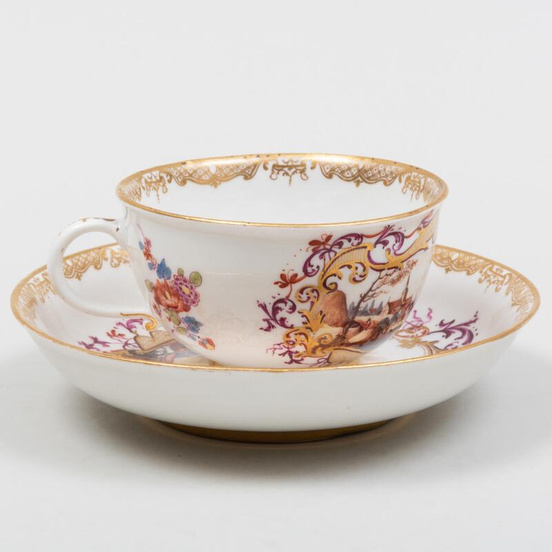 Appraisal: Meissen Porcelain Cup and Saucer Decorated with a Harbor Scene