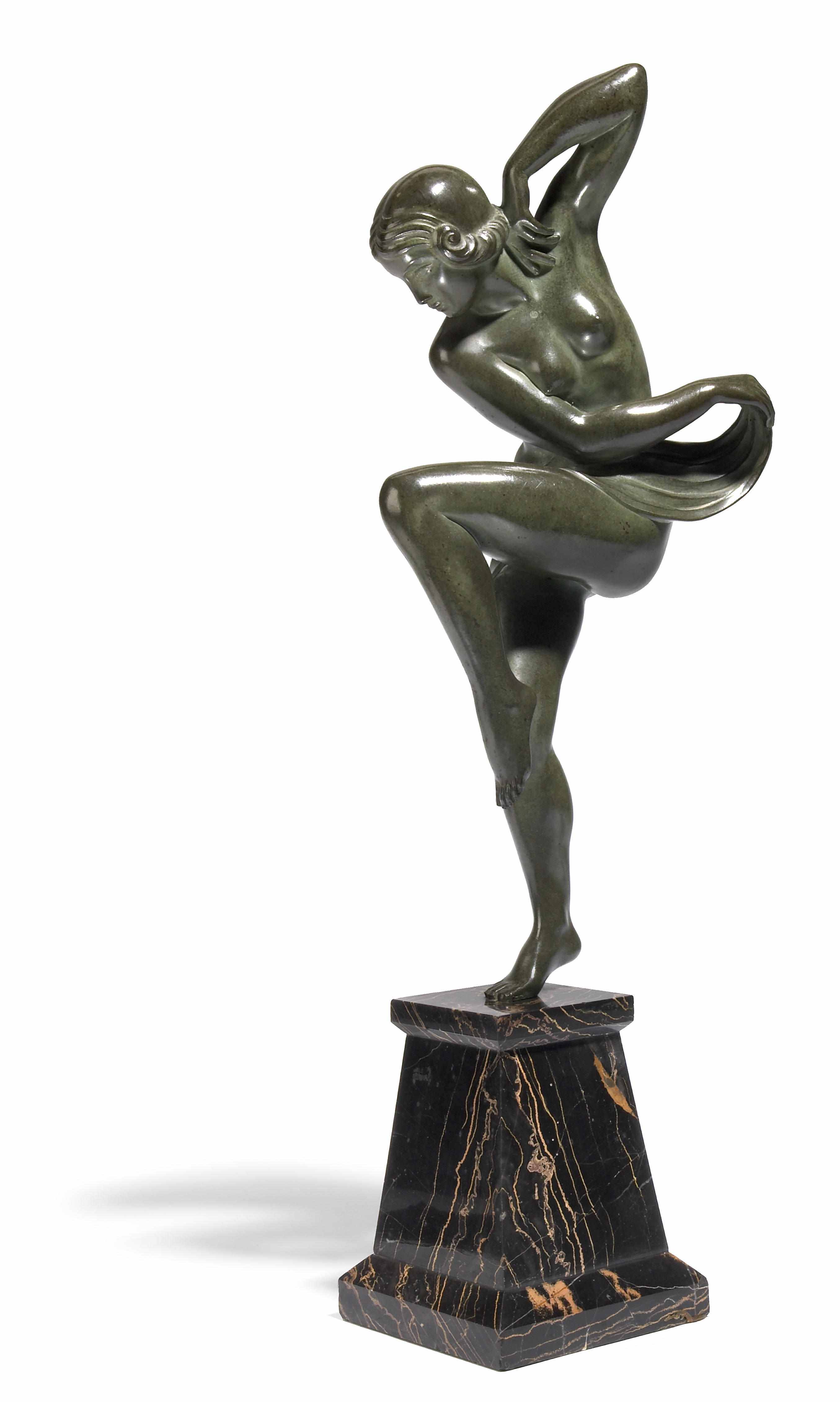 Appraisal: An Art Deco green patinated bronze figure of a female