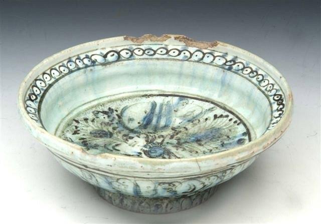 Appraisal: AN ISNIK TURQUOISE GLAZED CIRCULAR BOWL with simple decorated border