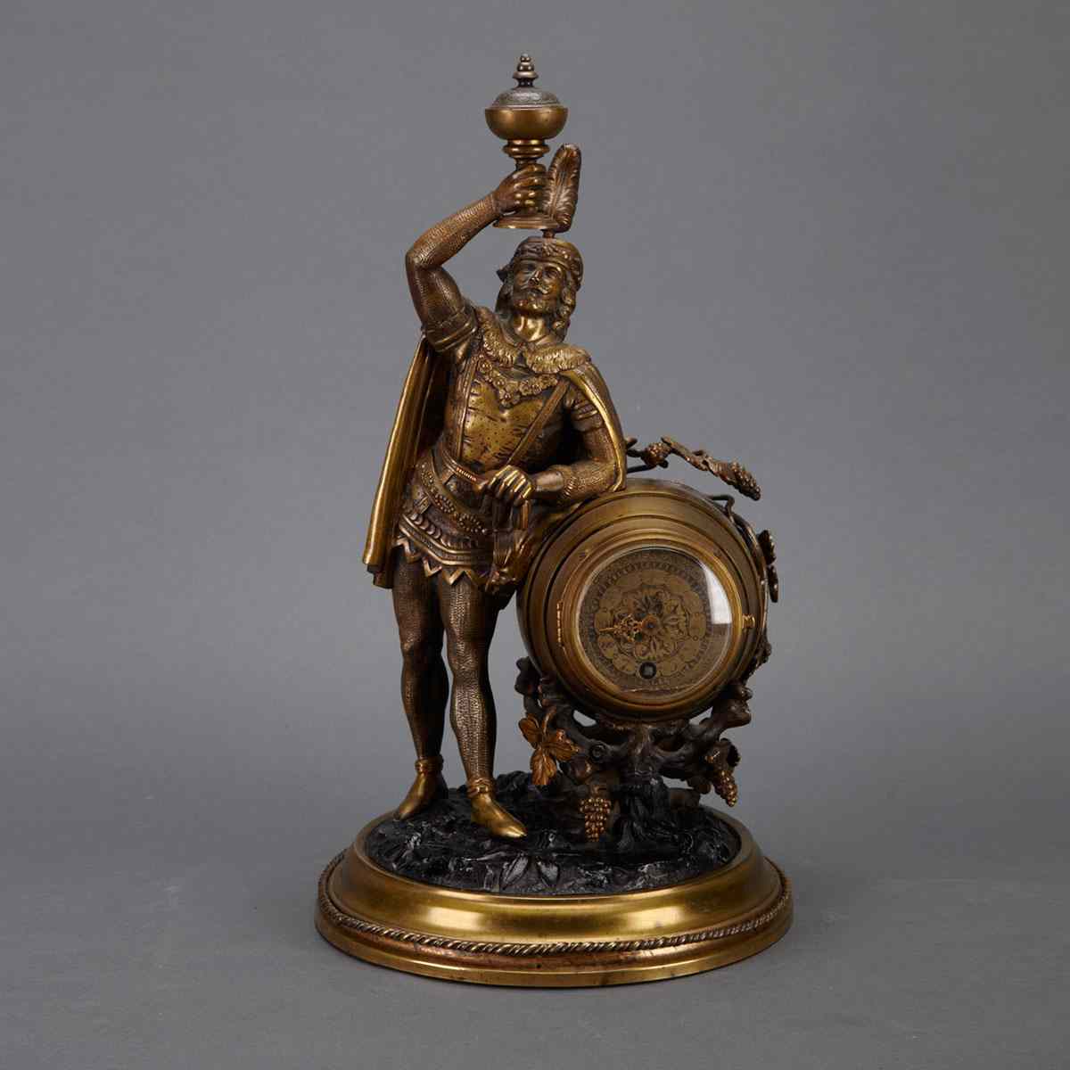 Appraisal: French Gilt Bronze and Lacquered Metal Figural Table Clock th