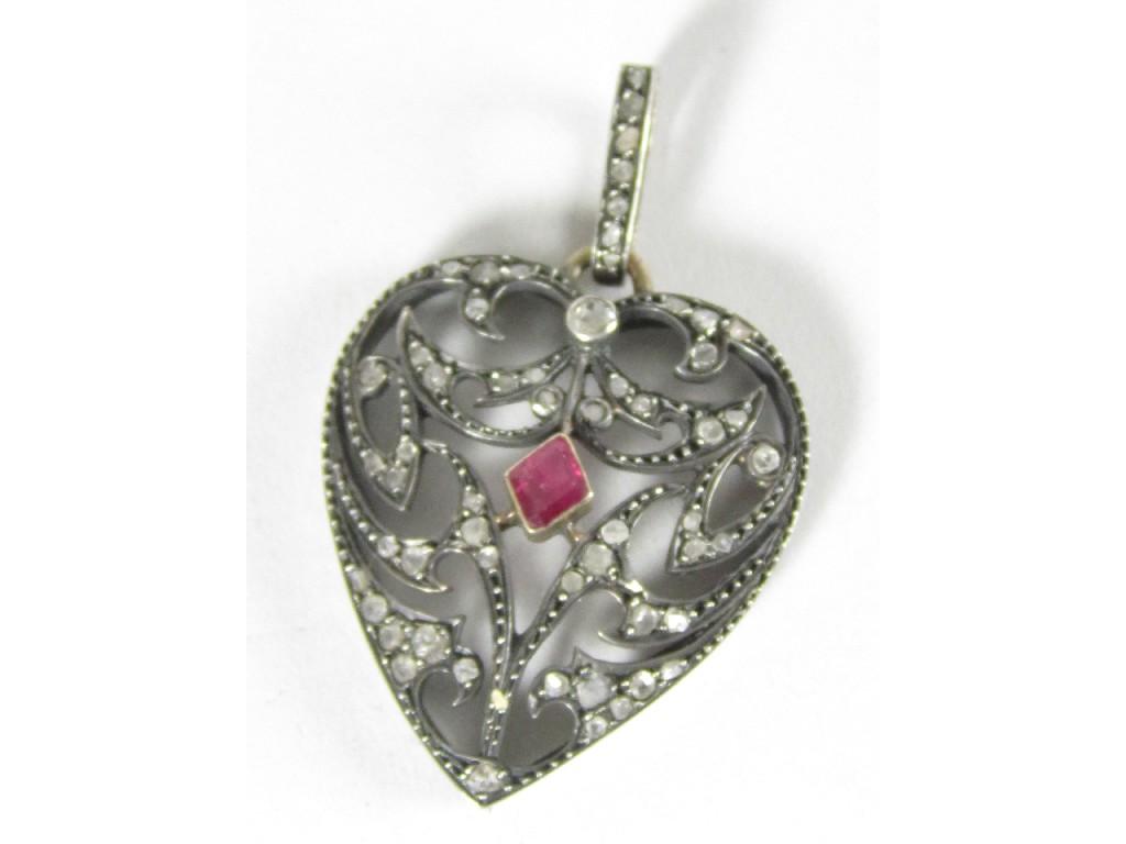 Appraisal: A Diamond and Ruby Pendant the openwork heart shaped plaque