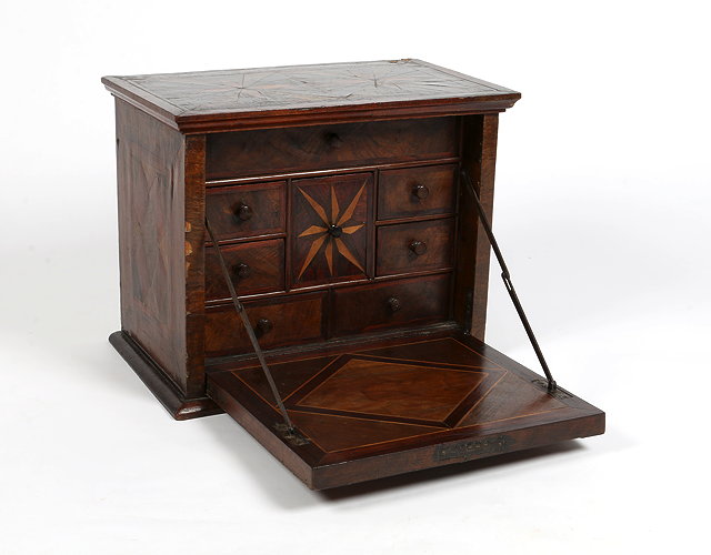 Appraisal: AN TH CENTURY WALNUT TRAVELLING WRITING CABINET the top inlaid