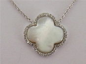 Appraisal: A white metal tests carat gold mother of pearl and