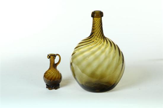 Appraisal: TWO PIECES OF BLOWN AMBER GLASS Probably Mexico th century