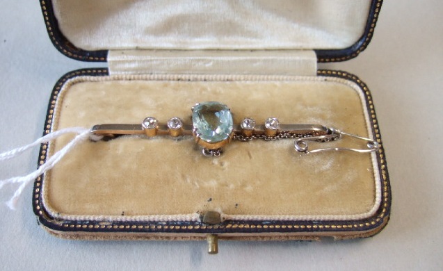 Appraisal: A gold aquamarine and diamond set bar brooch claw set