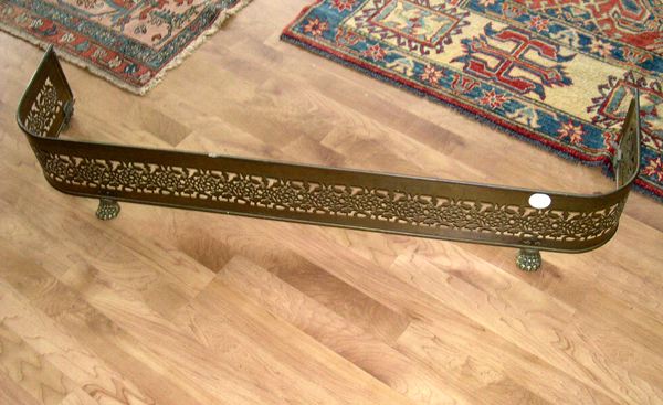 Appraisal: Late Victorian Elaborately Pierced Paw-Footed Brass Fireplace Fender of C-form