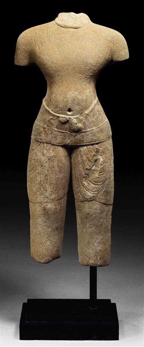 Appraisal: SANDSTONE MALE TORSO Khmer Baphuon style th century H cm