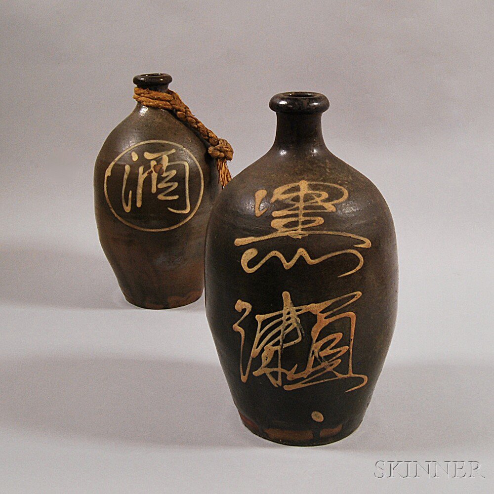 Appraisal: Two Japanese Bizen Ware Sake Bottles th century each decorated