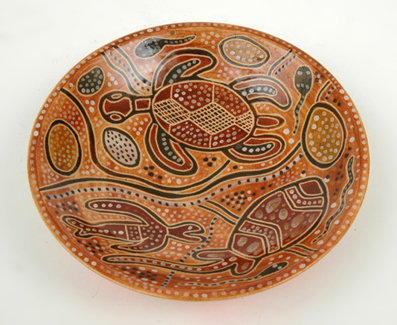 Appraisal: CARL COOPER Victoria circa Circular earthenware dish decorated with indigenous