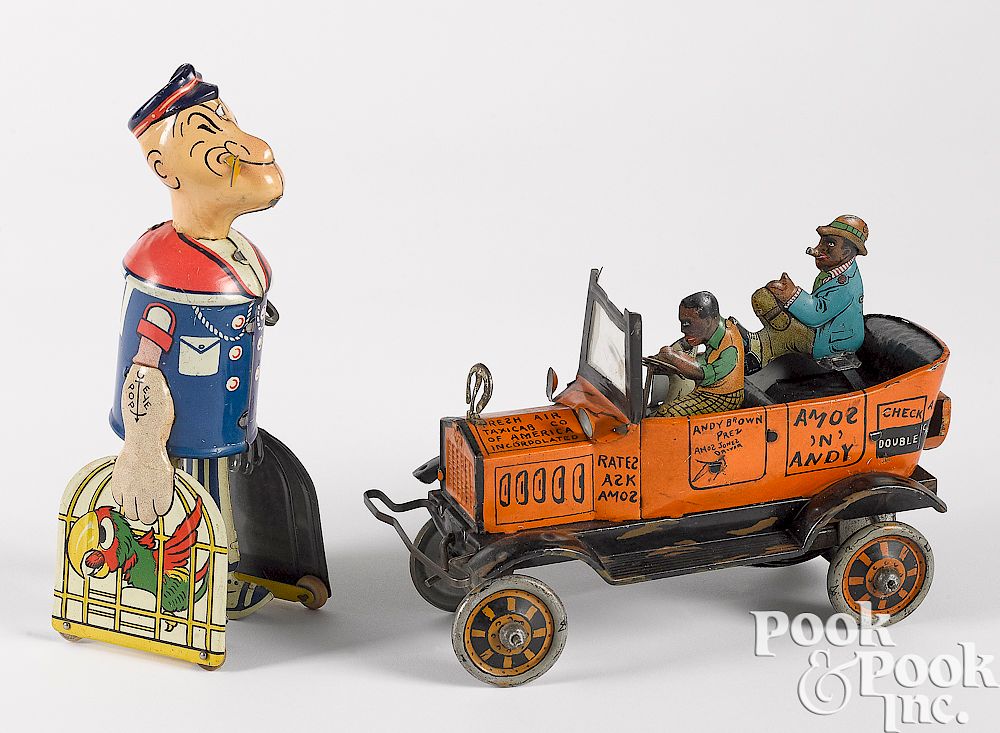 Appraisal: Two Marx tin lithograph wind-up toys Two Marx tin lithograph