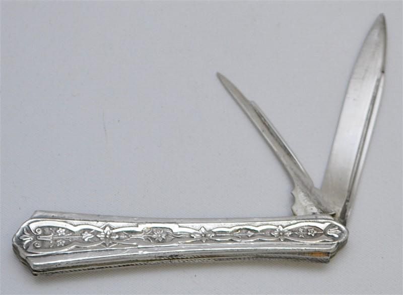 Appraisal: th c ORNATE COIN SILVER FOLDING POCKET FRUIT KNIFE Antique