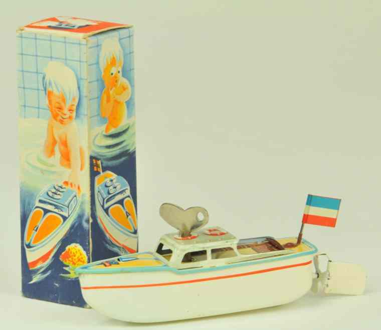 Appraisal: ARNOLD MOTORBOAT WITH BOX Germany lithographed tin well scaled with