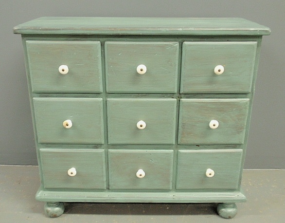 Appraisal: - Pine apothecary chest with blue paint decoration and porcelain