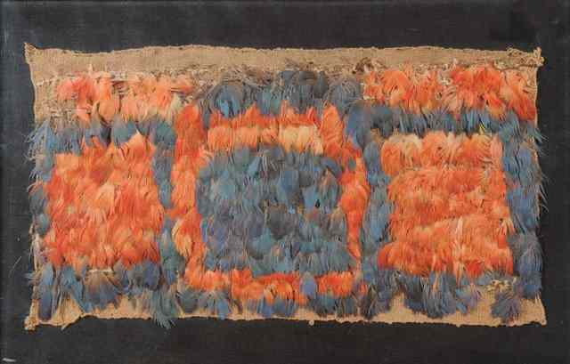 Appraisal: A NAZCA CULTURE MINIATURE TABARD blue and red feather appliqu