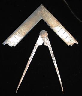 Appraisal: Two Sterling Silver Masonic Jewels Masonic Compass And Square Rendered