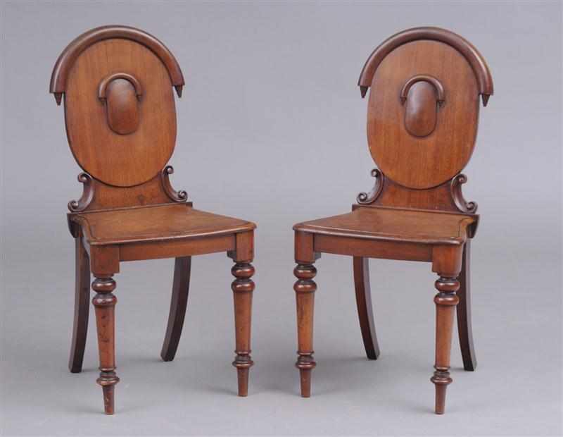 Appraisal: PAIR OF REGENCY CARVED MAHOGANY HALL CHAIRS Stamped J L