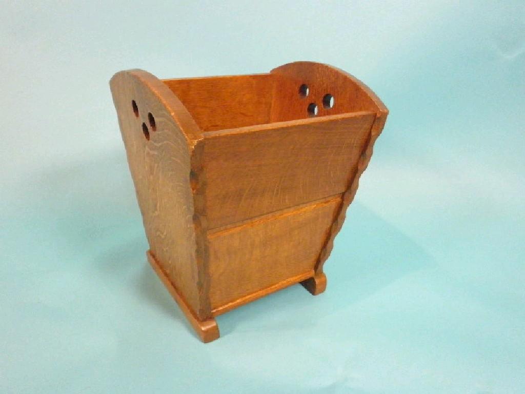 Appraisal: A small oak waste paper bin in the manner of