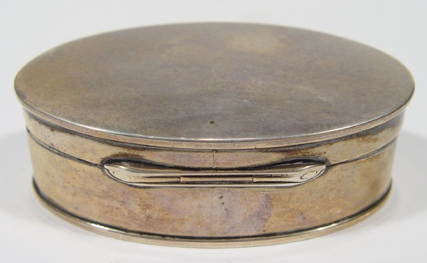 Appraisal: Oval silver box with hinged lid retailed by Garrard and