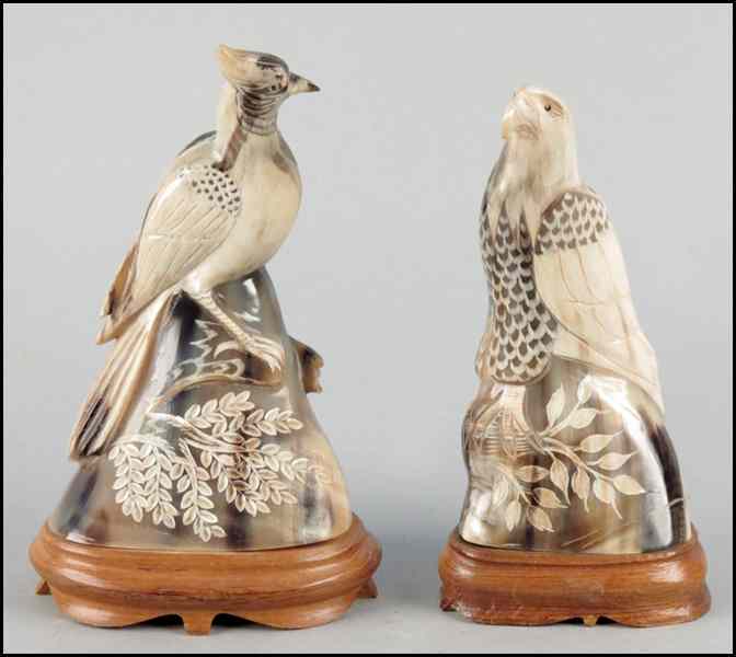 Appraisal: TWO CARVED HORN BIRD COMPOSITIONS Raised on '' wood bases