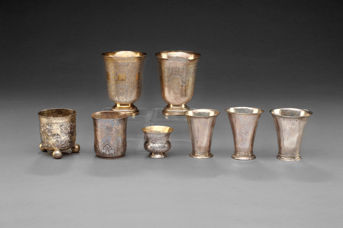 Appraisal: TWO SIMILAR CONTINENTAL SILVER-GILT BEAKERS PROBABLY FRENCH Each surrounded by