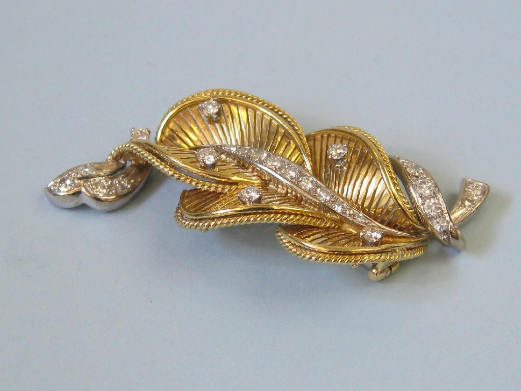 Appraisal: A Diamond Leaf Brooch the pierced plaque claw and pav