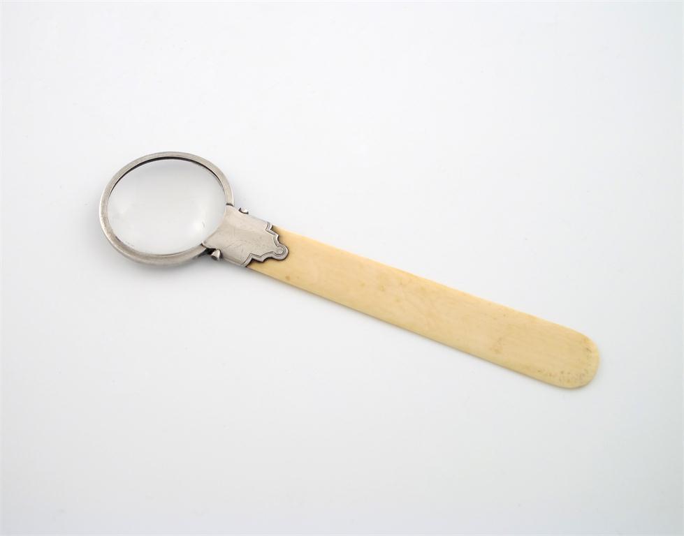 Appraisal: A silver mounted magnifying glass letter knife