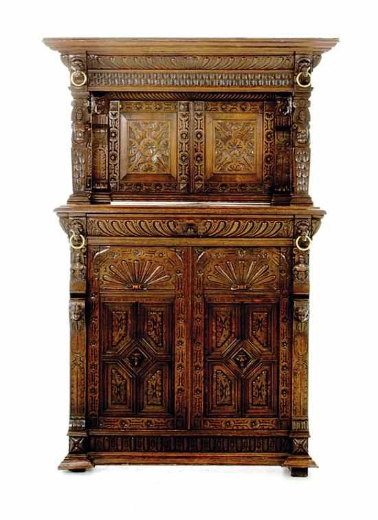 Appraisal: Jacobean style carved oak court cupboard late th century molded