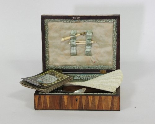 Appraisal: A parquetry inlaid work box the cover with geometric design