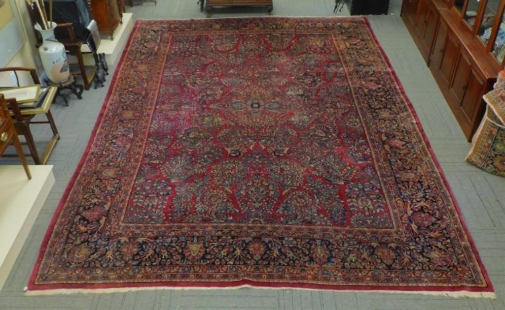 Appraisal: S PAINTED SAROUK ORIENTAL RUG RED FIELD overall floral design