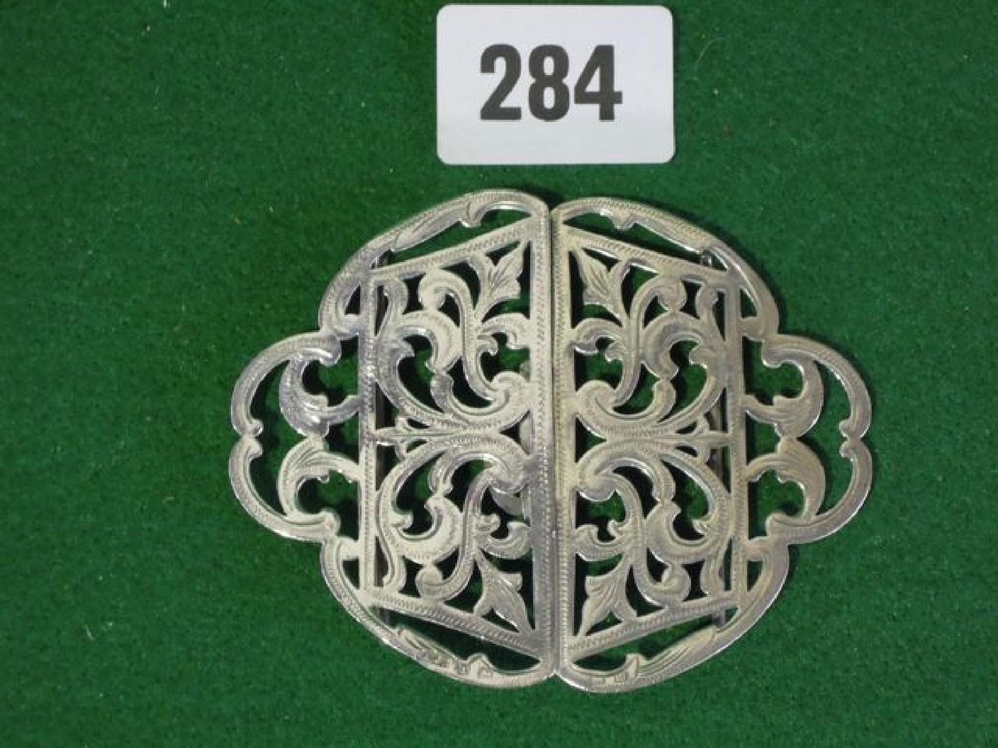 Appraisal: A silver nurses buckle with pierced decoration hallmarked Arthur Johnson