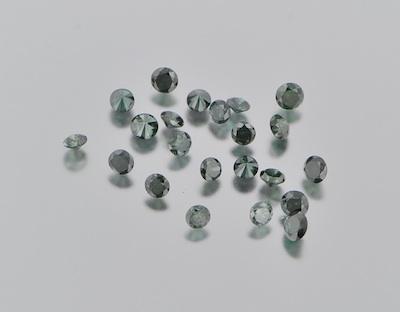 Appraisal: A Group of Unmounted Green Diamonds Total Weight Carat round