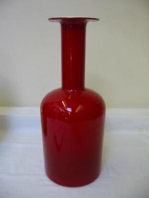 Appraisal: A HOLMEGAARD SWEDISH BOTTLE VASE with flared rim coloured red