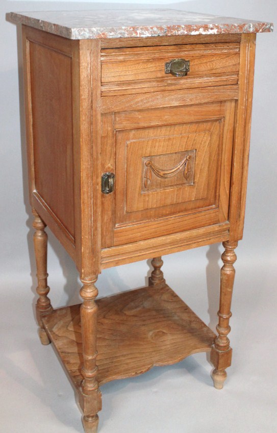 Appraisal: An early thC French marble topped side cabinet with a