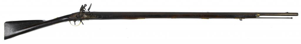 Appraisal: A FLINTLOCK MUSKET with cm swamped barrel the lock engraved