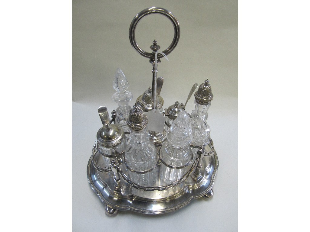 Appraisal: Silver plate seven bottle cruet stand