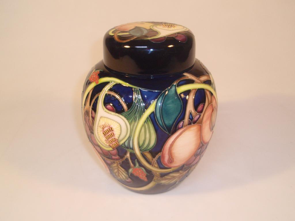 Appraisal: Moorcroft Modern lidded ginger jar decorated with fruit including figs